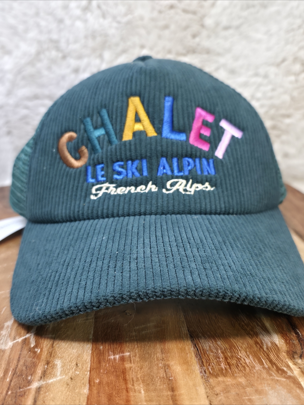 Anthropologie Dark Green Corduroy Cap with Multicolor 'CHALET' Embroidery
